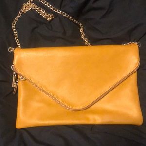 Mustard yellow envelope clutch